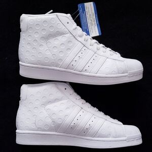 Adidas White High-Top Sneakers with Circle Pattern